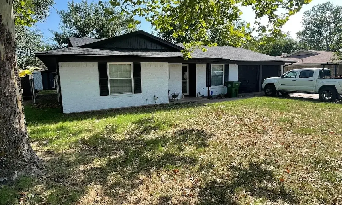 Professional roofing crew working on a residential roof in Diamond Springs